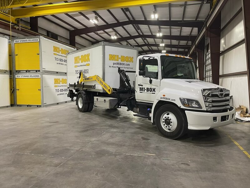 MI-BOX delivery truck at Houston warehouse